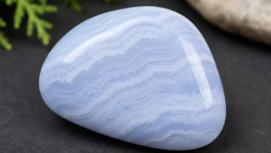 a pale blue lace agate stone with delicate white banding