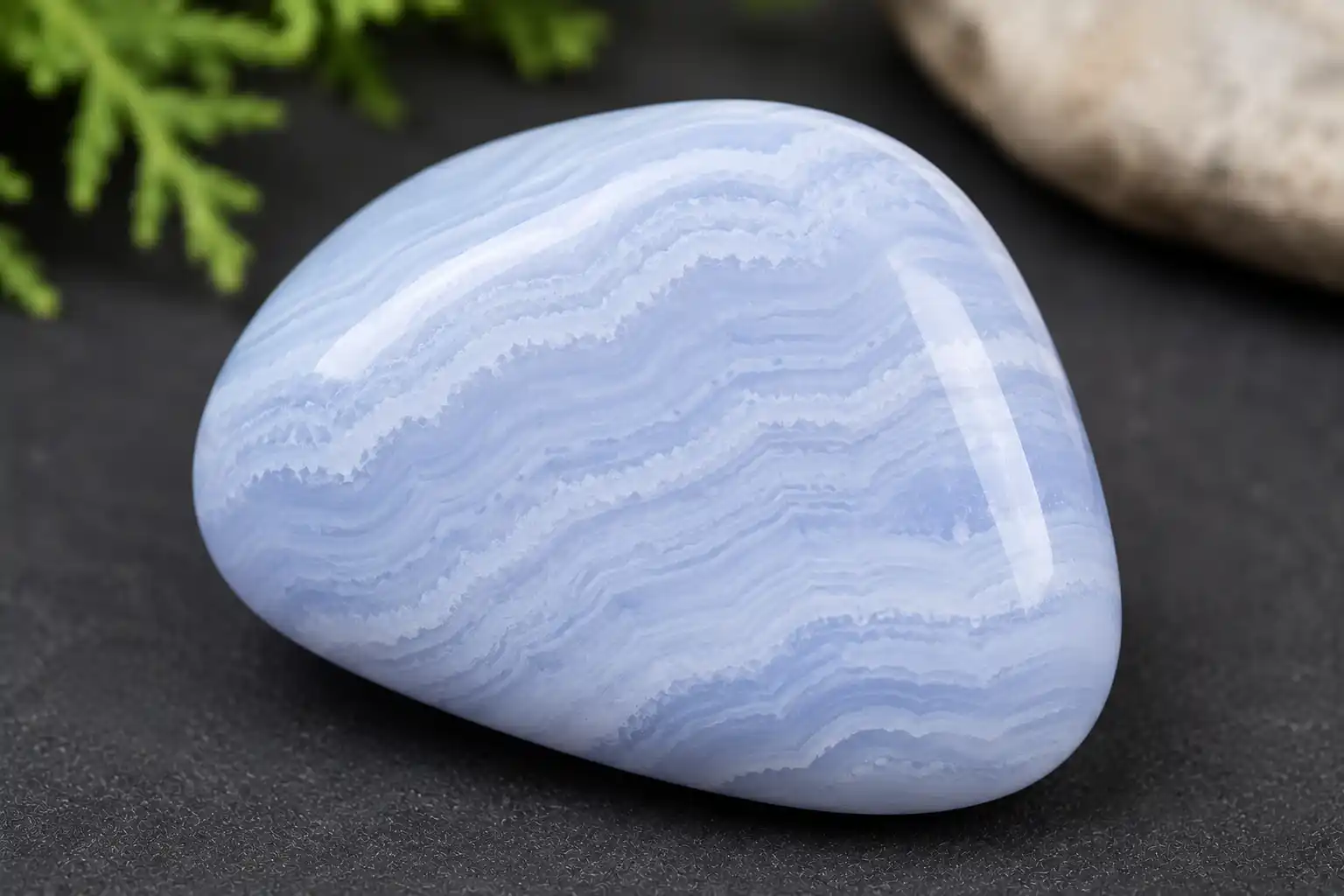 a pale blue lace agate stone with delicate white banding