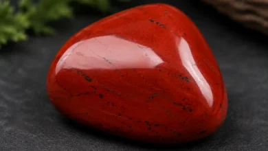 a polished brick-red red jasper stone