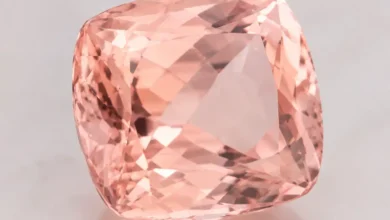 a soft peachy-pink morganite gemstone