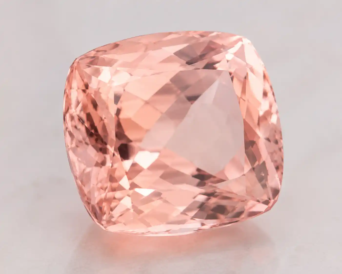 a soft peachy-pink morganite gemstone