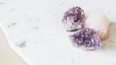 calming amethyst and lepidolite crystals arranged in soft natural light