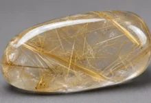 clear quartz threaded with golden rutile needles