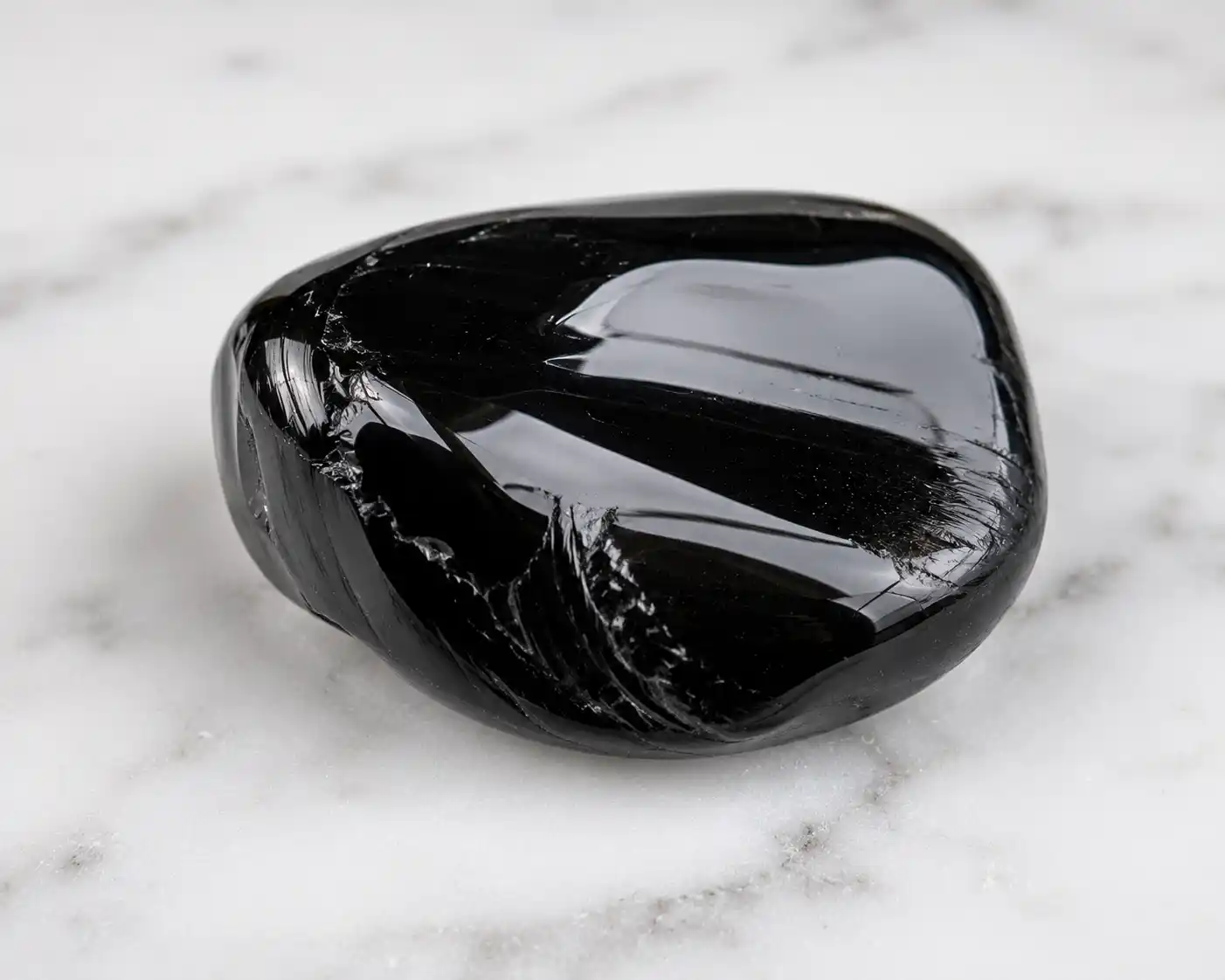 a polished black obsidian stone