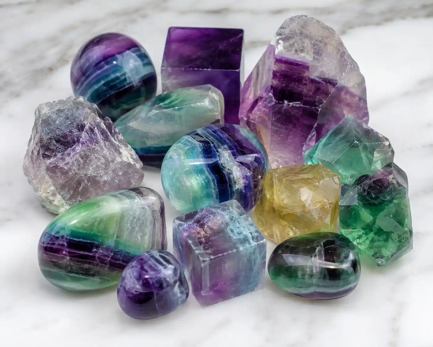 a piece of rainbow fluorite showing green and purple bands