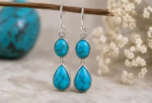 Turquoise earrings on delicate twig