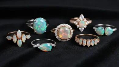 opal ring showing rainbow play-of-color in a protective bezel setting