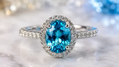 blue zircon ring in a protective setting catching the light