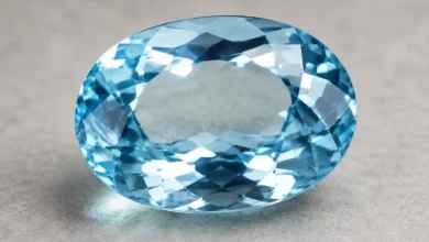 aceted sky-blue aquamarine gemstone catching the light