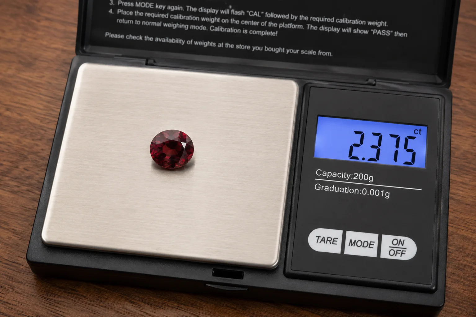 photo of a garnet on a digital carat scale