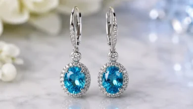 pair of blue zircon drop earrings sparkling near the face