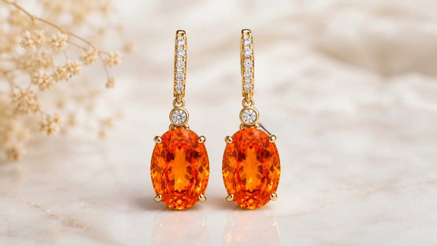 photo of a pair of mandarin spessartite drop earrings