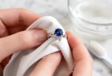 photo of a sapphire ring being cleaned