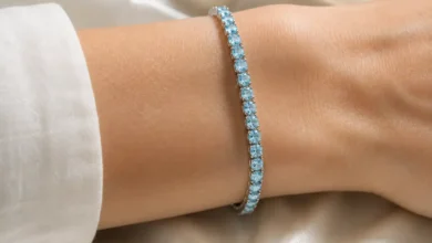 photo of a sky-blue aquamarine tennis bracelet on a wrist