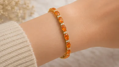 photo of a spessartite bracelet on a wrist