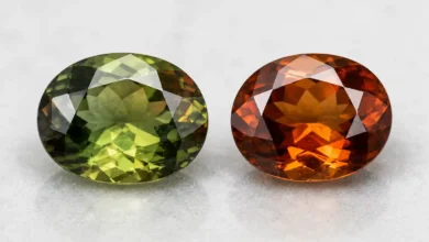 faceted andalusite gemstones showing green and reddish-brown pleochroic colors