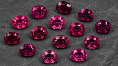 photo of loose rhodolite garnets in several tones