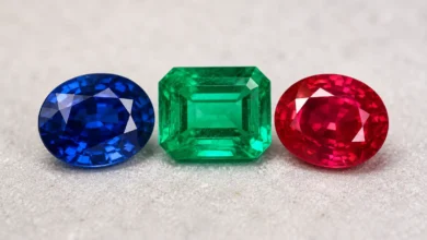 photo of sapphire, emerald, and ruby together